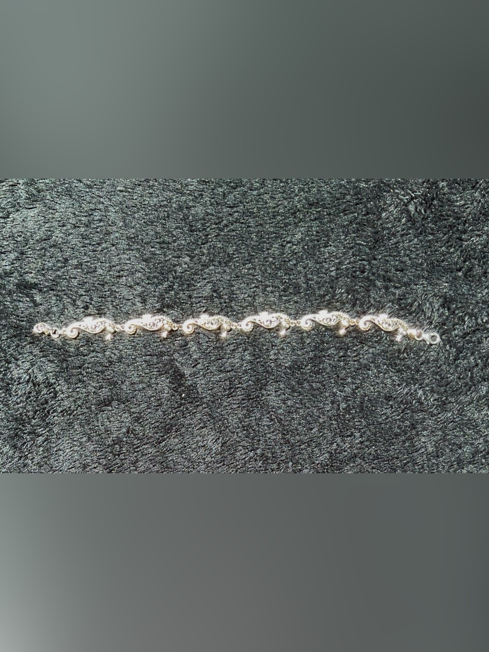 Elegant Silver-Tone Swirl Link Bracelet